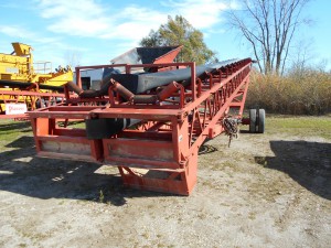 Superior 36" x 80' portable radial stacker, dual drive hydraulic powered. Excellent condition.